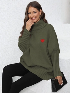 Oversized dark green turtleneck sweater with red heart embroidery and ribbed knit details