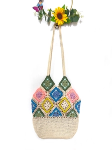 Colorful crochet shoulder bag with bohemian geometric grandmother square patterns