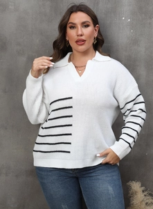 Close-up of the textured knit fabric and contrast stripes on the white V-neck polo sweater