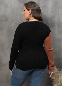 Detailed back view of a ribbed knit sweater featuring black and brown color-blocking panels