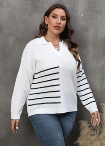 Detail of V-neck polo collar and knitted texture on white striped pullover sweater