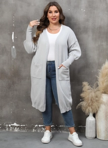 Gilet long en maille gris clair pour femme avec de grandes poches et manches bouffantes