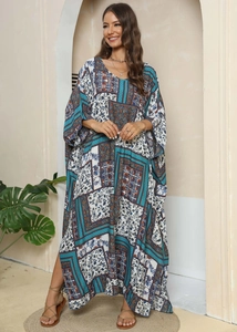 Women's Bohemian V-neck maxi dress with ethnic print and side slits for beach vacations