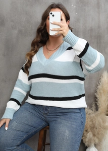 Detail of V-neck striped plus size sweater with blue white and black color block