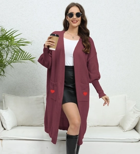 Burgundy oversized knit cardigan with balloon sleeves and red heart embroidered pockets