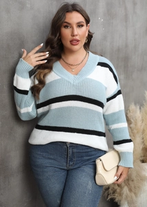 Detailed knit texture of V-neck plus size sweater with blue white and black stripes