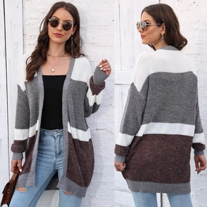Front and back view of a color block oversized knit cardigan with grey and brown stripes