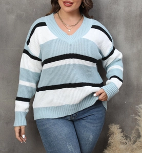 Detail of V-neck striped knit sweater in light blue, white and black for casual autumn look