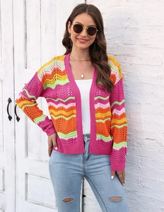 Detail shot of colorful wave-pattern crochet cardigan featuring vibrant knit texture
