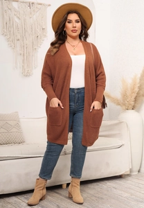 Oversized rust red knit cardigan with batwing sleeves and large front pockets