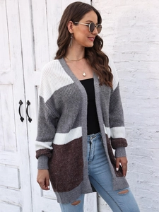 Women's long sleeve color block knit cardigan sweater in white, grey, and brown patchwork