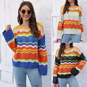 Detail of colorful rainbow wavy knit texture on a cozy crewneck sweater for women