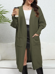 Detail view of military green oversized cardigan with large pockets and ribbed cuffs