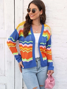 Close-up of vibrant rainbow wave crochet patterns on a stylish knitted cardigan