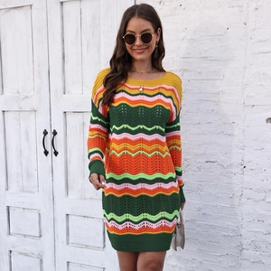 Detailed macro view of the colorful crochet wavy pattern on this striped mini dress