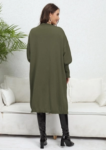 Rear view of a long army green knitted cardigan with ribbed cuffs and relaxed silhouette
