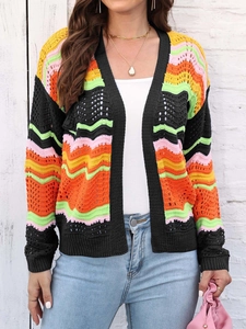Close-up of wavy rainbow striped knit cardigan with delicate openwork crochet texture