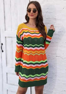 Detail of colorful zigzag pointelle knit pattern on a women long sleeve dress