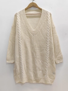 Women's cream oversized V-neck cable knit sweater dress with loose long sleeves