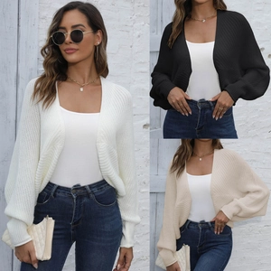 Chunky knit cardigan for women featuring stylish lantern sleeves in white, black and beige