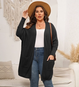 Women's black oversized batwing sleeve cardigan with large pockets in soft knit style