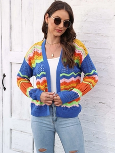 Detail of colorful rainbow striped knit cardigan with intricate crochet hollow pattern