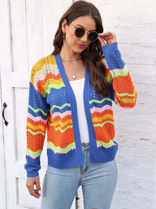 Close-up of multicolored crochet knit cardigan with vibrant wave patterns and airy texture