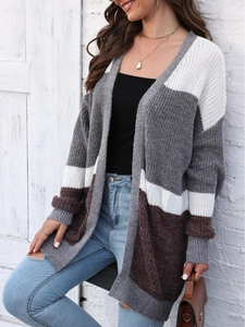 Women's color block oversized knit cardigan in grey, white, and brown stripe design