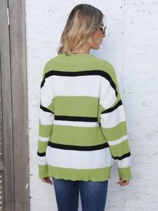 Detailed back view of a loose-fit knit sweater with green white and black stripes