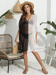 Detail of color block crochet beach cover up with deep V-neck and hollow knit pattern