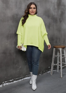 Detail of oversized neon green high neck knit sweater with stylish side split hem
