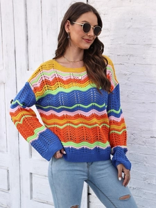 Close-up of multicolor rainbow wavy stripes and crochet knitting texture on a sweater