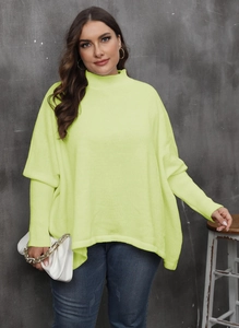 Detail of neon green loose-knit sweater featuring a high neck and drop shoulder design