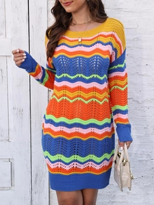 Close-up of colorful wavy knit pattern and crochet texture on a long sleeve dress