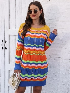 Detailed knit texture and vibrant rainbow wave pattern on the long sleeve mini dress