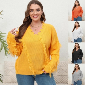 Detail showing various colors of women's V-neck knit sweaters with fringe details