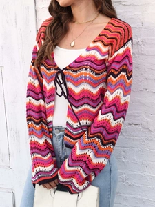 Detailed knit texture and colorful wave patterns on V-neck cardigan with lace-up front