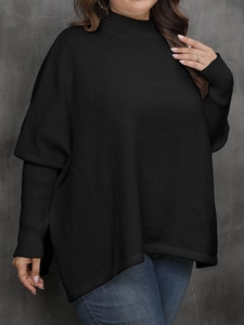 Detail of loose black plus size sweater featuring batwing sleeves and high neckline