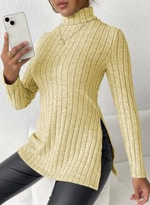 Detail shot of slim-fit turtleneck sweater with vertical ribbed texture and side slits