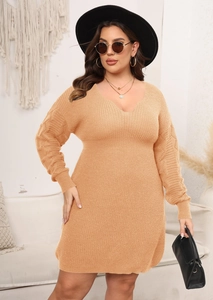 Detail of V-neck knitted plus size dress showing hollow-out texture on sleeves