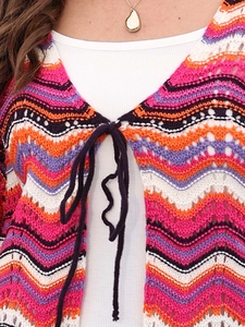 Detail of colorful crochet knit cardigan with wave stripes and front tie closure