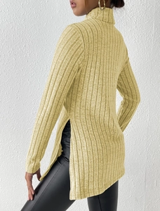 Detailed texture of ribbed knit sweater in mustard yellow with side slit design