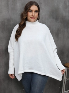 Detail of white rib-knit oversized sweater featuring a mock neck and loose batwing sleeves