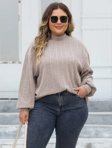 Detail of plus size mock neck ribbed knit top with long lantern sleeves in dusty purple