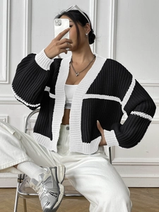 Women's black and white contrast knit cardigan with V-neck and casual loose fit design