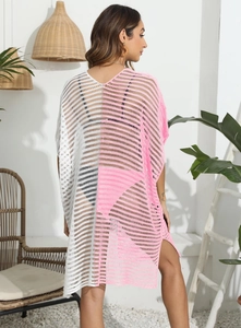Detail view of the vertical stripe crochet pattern and side slit on the beach cover-up