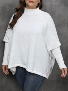 Close-up of mock neck and soft knit texture on this white oversized batwing sleeve sweater