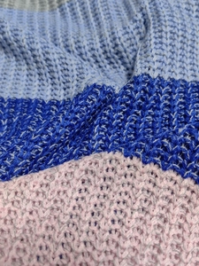 Women's knit tank top with colorful rainbow stripe pattern and textured honeycomb fabric