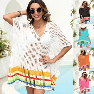 Detail of V-neck crochet beach cover-up featuring colorful striped hem in 5 vivid colors