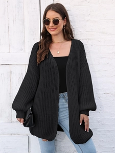 Women's loose black chunky knit cardigan sweater with long sleeves and casual fit